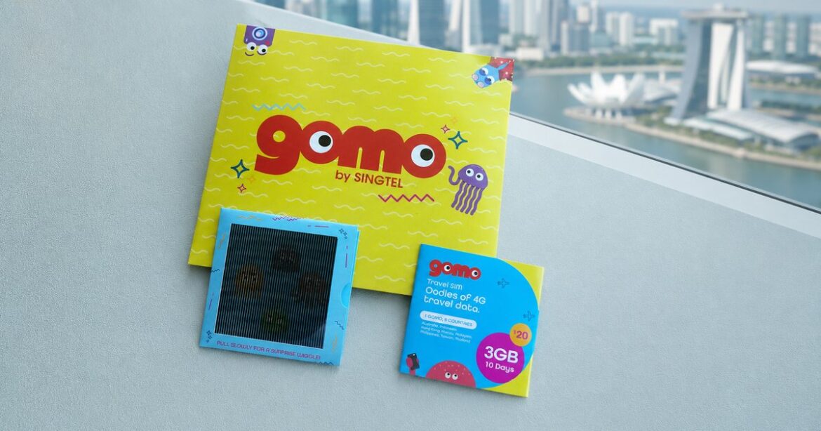 GOMO by Singtel SIM only plan starter kit from 2019 against the Singapore skyline and Marina Bay Sands