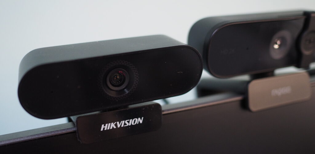 Hikvision DS-E12 1080p webcam mounted on monitor