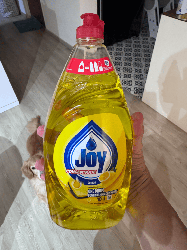 Joy Concentrate lemon dishwashing liquid, 780ml bottle, One Drop powerful grease removal