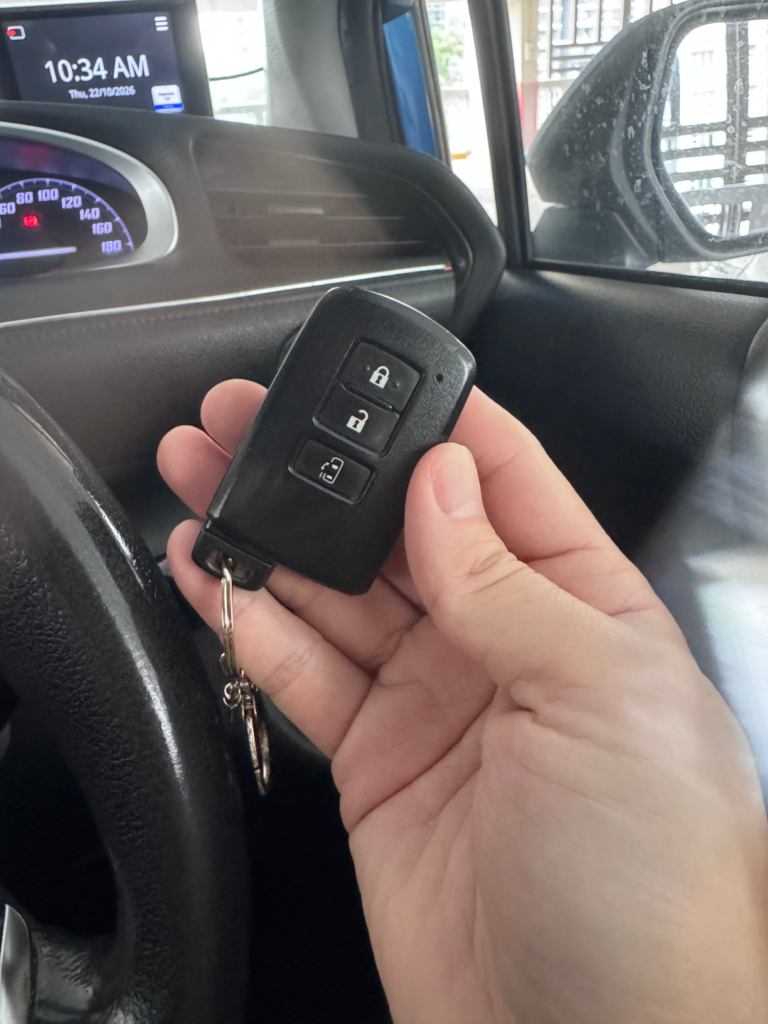 Physical smart key remote for a Tribecar Toyota Sienta with lock, unlock and sliding door buttons